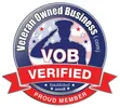 A circular badge with red and blue colors, a white star in the center, and text that reads 'Veteran Owned Business