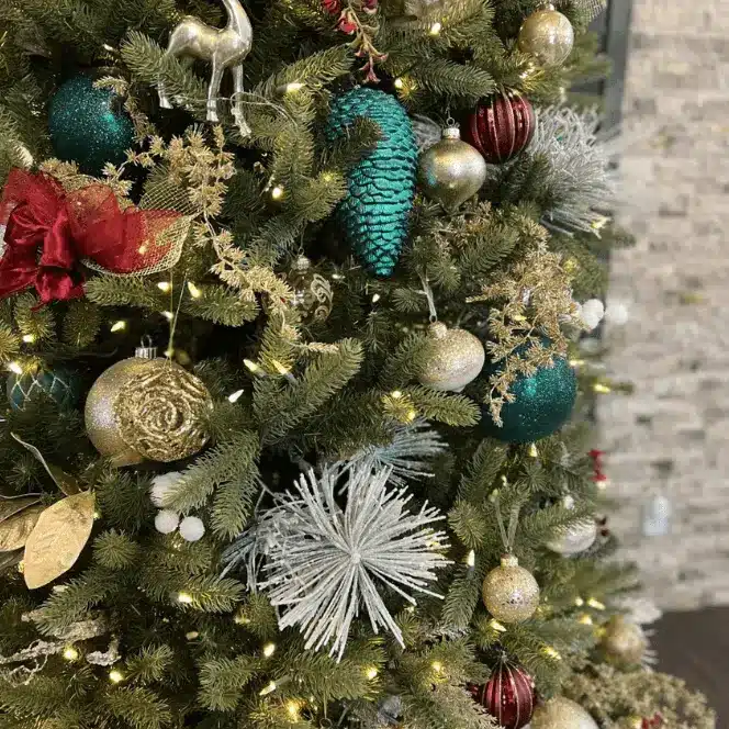 A close-up of a Christmas tree adorned with festive decorations